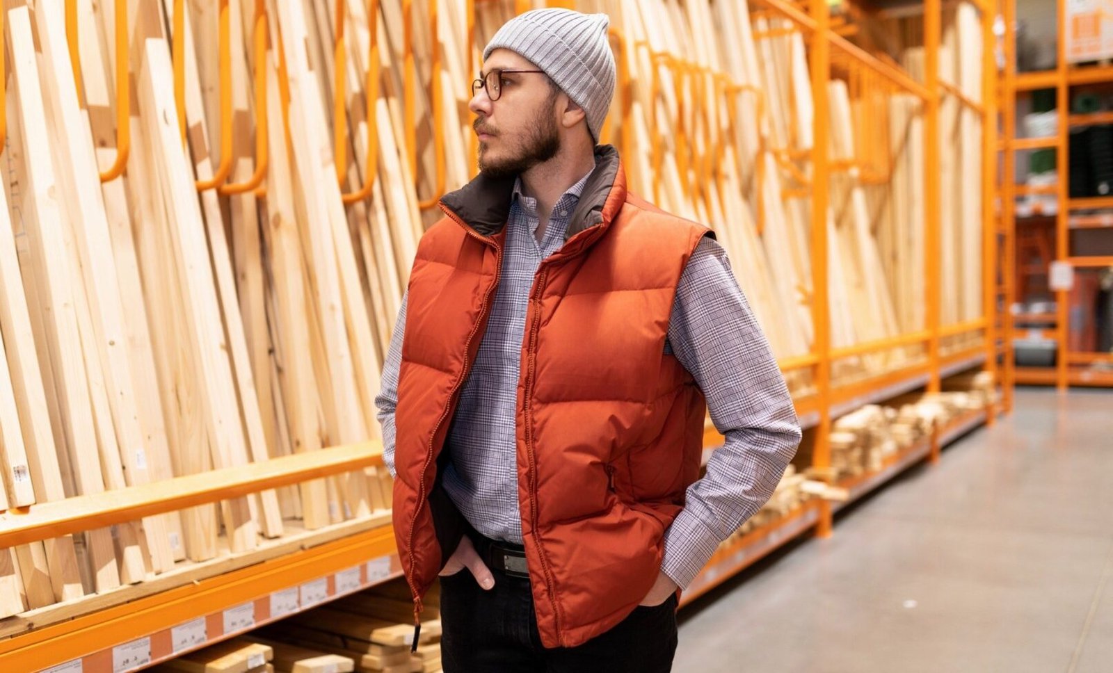 a carpenter in a lumber hardware store chooses woo lemc3