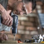 a professional carpenter uses wood screws screws v2